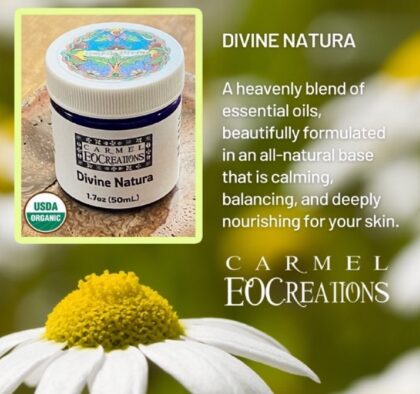 Jar of Carmel Eocreations Divine Natura cream with a white daisy flower and yellow center, green background, and product description.
