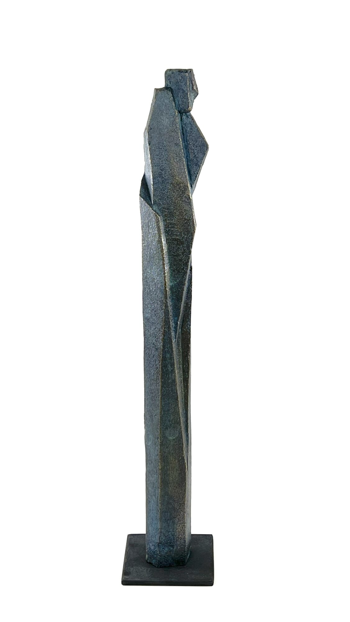 Tall, abstract stone sculpture with geometric shapes and a textured surface, mounted on a small rectangular base.