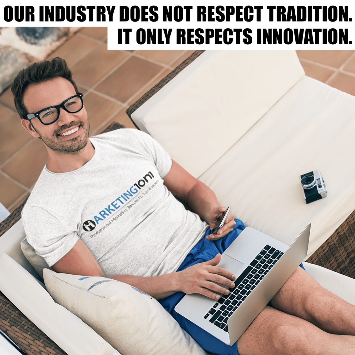 Man with glasses smiling, using a laptop on a couch, with text about industry respect and innovation.