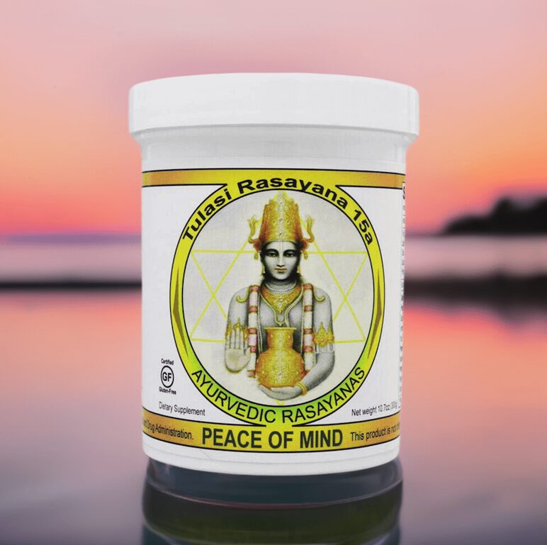 Container with a label featuring a deity figure, surrounded by a yellow circle, with text about Rasayana and peace of mind.